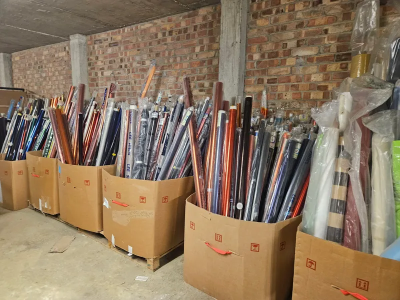 A wide view of the Scrapstore's interior, shelves stacked with rescued materials