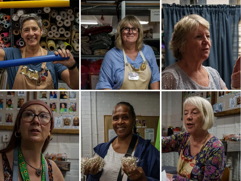 Six of Scrapstore's store volunteers, smiling among the shelves