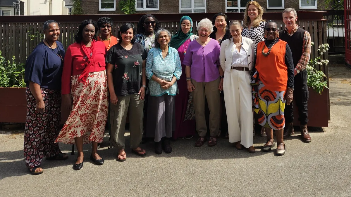 A group of Scrapstore volunteers and members together outside the store