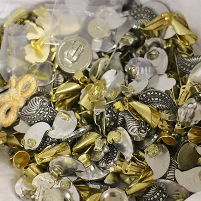 Donated gold and silver charms and jewellery findings